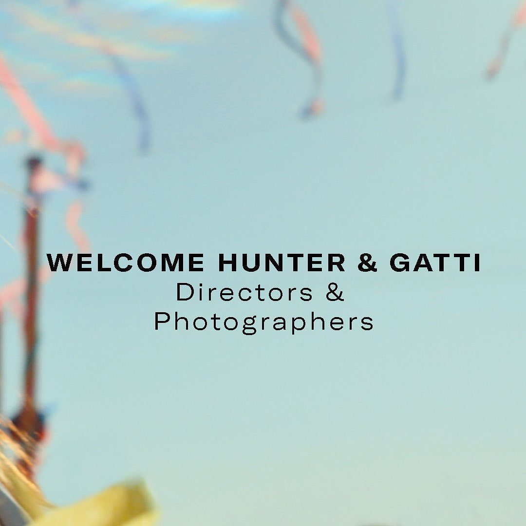 Welcome message with confetti: "WELCOME HUNTER & GATTI Directors & Photographers" against a bright sky-blue background.