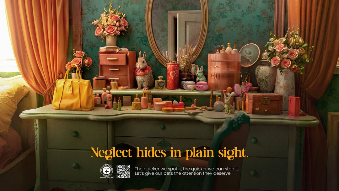 Vintage-style dressing table with cosmetics, rabbit figurines, and floral arrangements, evoking a nostalgic and whimsical atmosphere.