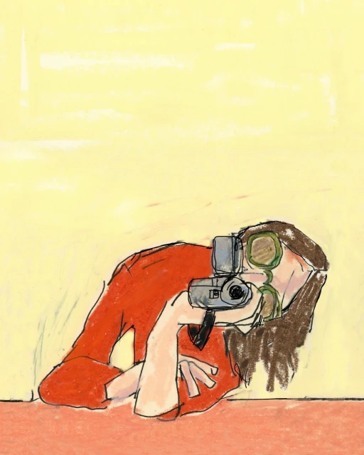 Illustration shows a person kneeling indoors, holding a vintage video camera, with a pale yellow background and reddish-orange floor.