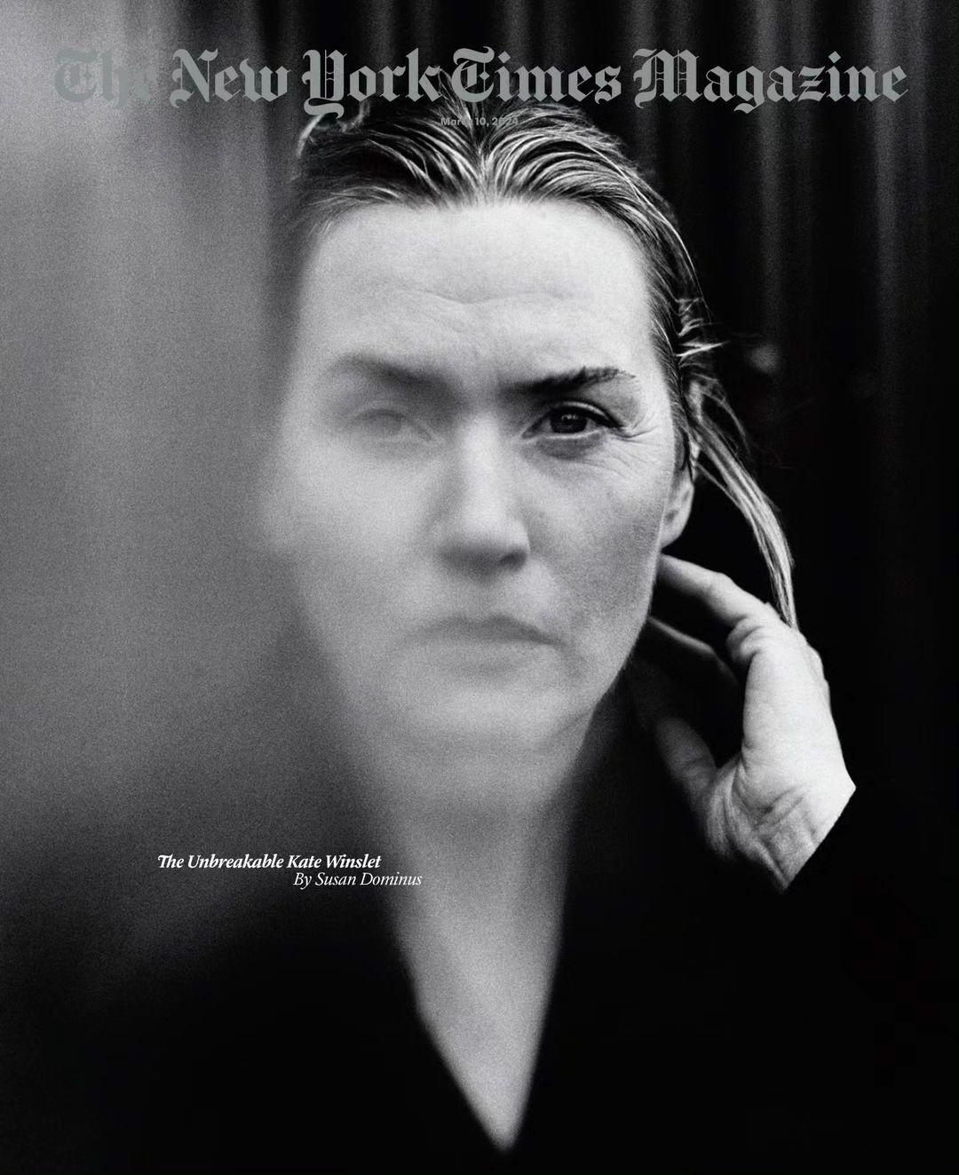 Black and white portrait of actress Kate Winslet on the cover of The New York Times Magazine, with a blurred figure in the foreground.