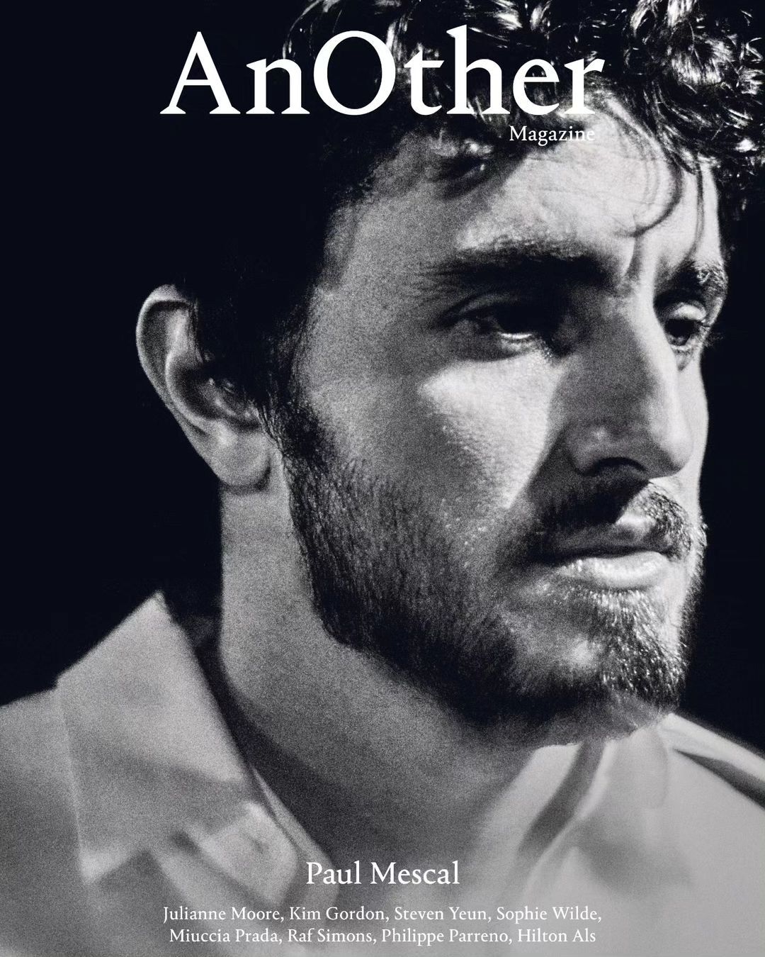 Black and white portrait of Paul Mescal on the cover of AnOther Magazine, featuring a close-up shot of his face and shoulder.