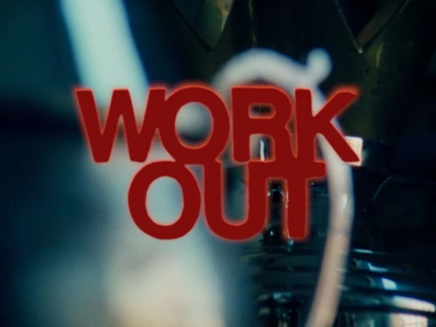 Red text "WORK OUT" with blurred background of metal and cables. The image has a vintage and grungy feel with a dark color palette.