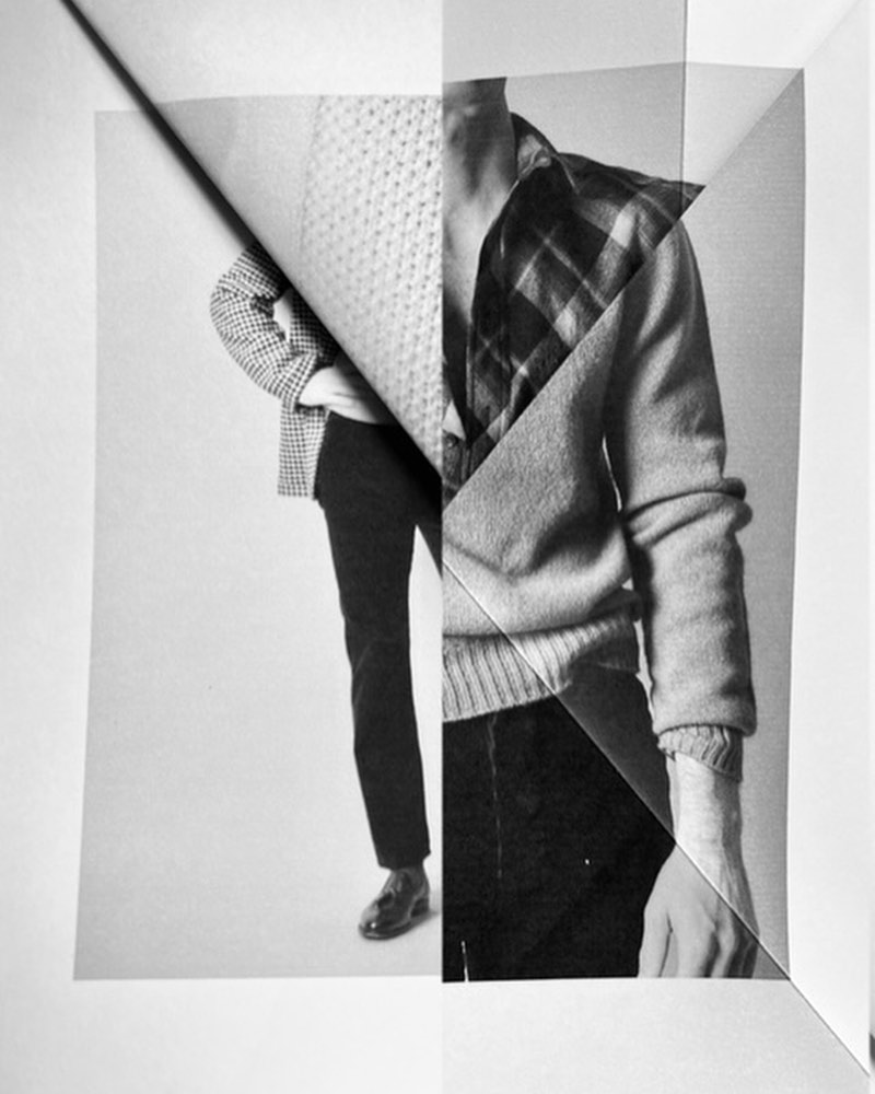 Collage featuring a cut-out image of a man wearing a sweater, plaid shirt, and dress pants, partially folded with a white background.