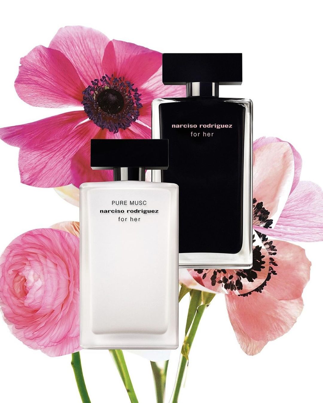 Narciso Rodriguez perfumes, showcasing white and black bottles, elegantly arranged with pink anemone flowers on a white backdrop.