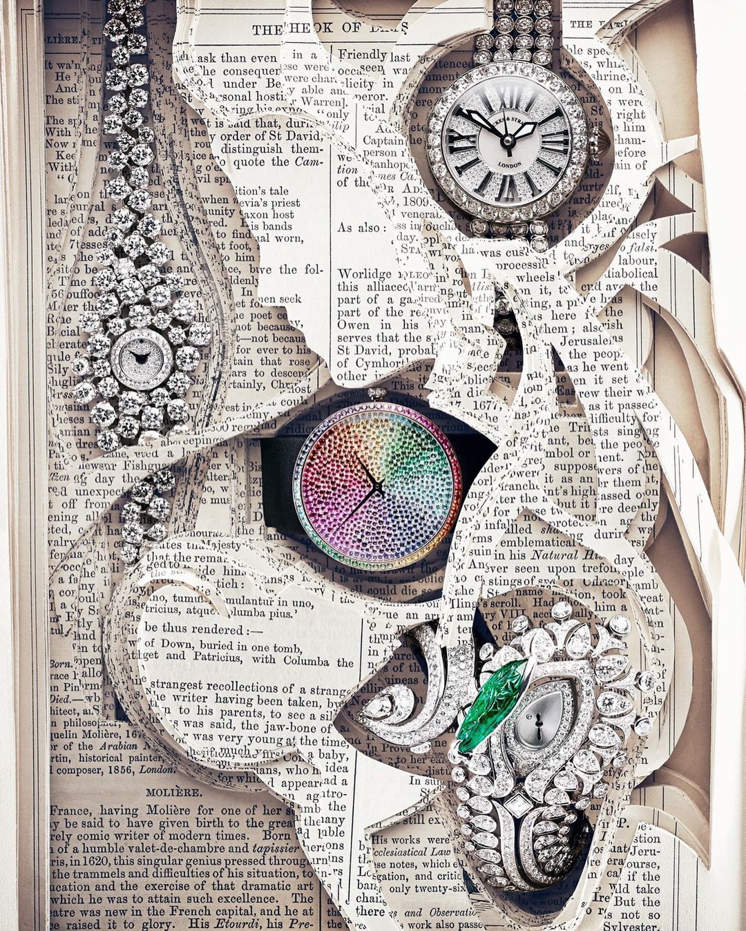 Artistic collage featuring several luxury watches with diamond detailing, layered on pages from antique book, creating a vintage aesthetic.