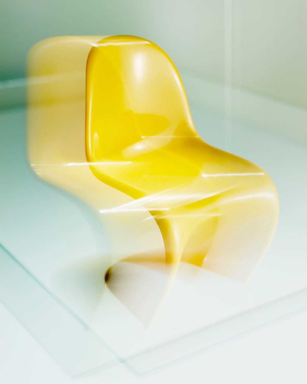 Stylish yellow chair design with a blurred motion effect creates a dynamic and modern aesthetic, suitable for interior decor and design.