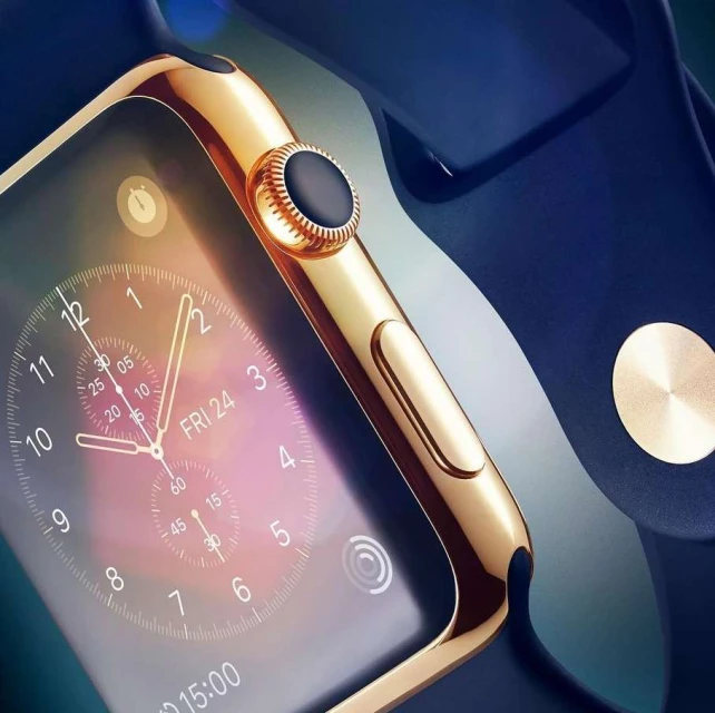 Gold smartwatch with a navy blue band displays a detailed clock face with visible text and numbers in a close-up studio shot.
