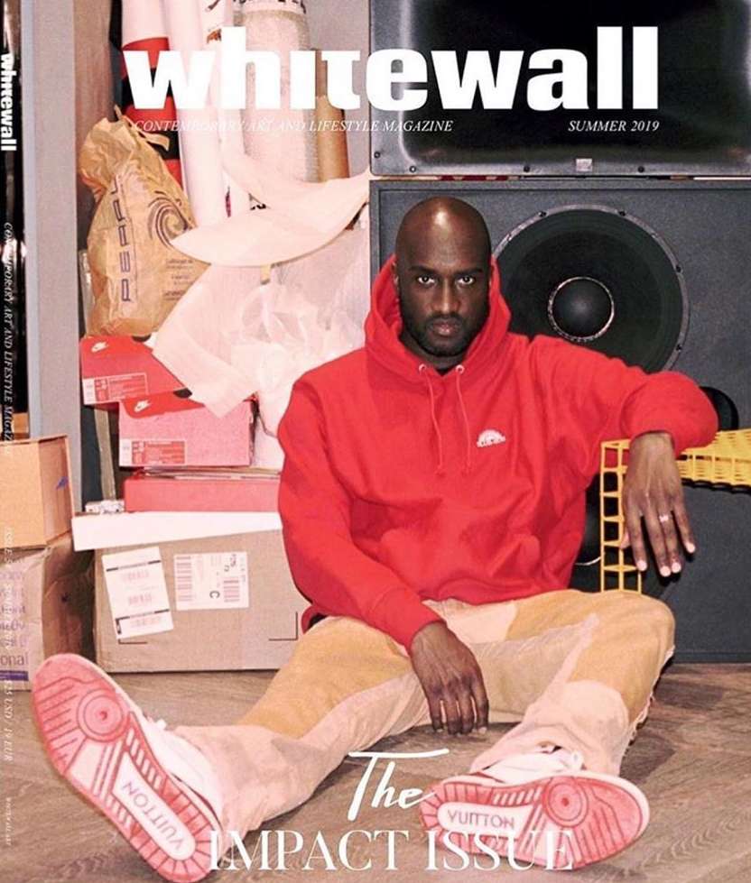 Whitewall magazine cover featuring Virgil Abloh in red hoodie and tan pants, seated against a speaker and boxes, Summer 2019 issue.