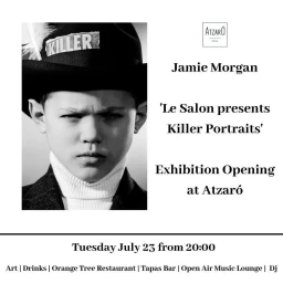 Black and white portrait of a young person wearing a dark hat with KILLER text and a white turtleneck by Jamie Morgan