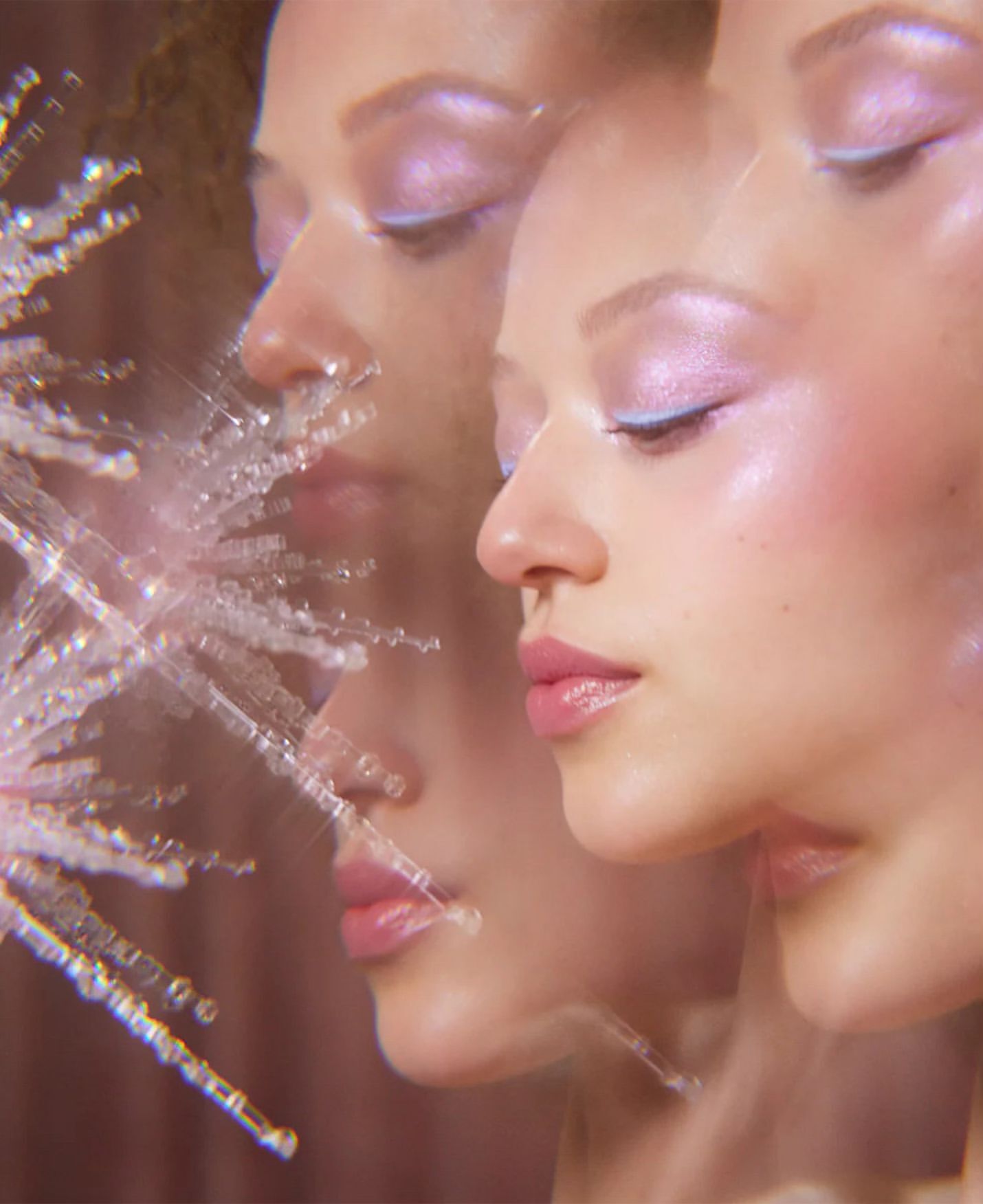 Close-up beauty shot features a light-skinned young adult woman with a shimmering lavender eyeshadow and glossy pink lipstick.