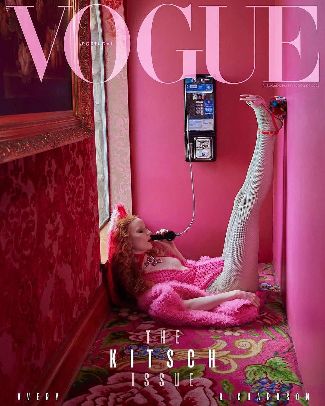 Vogue magazine cover featuring a woman in pink reclining and using a vintage telephone, framed by pink walls and a floral bed.