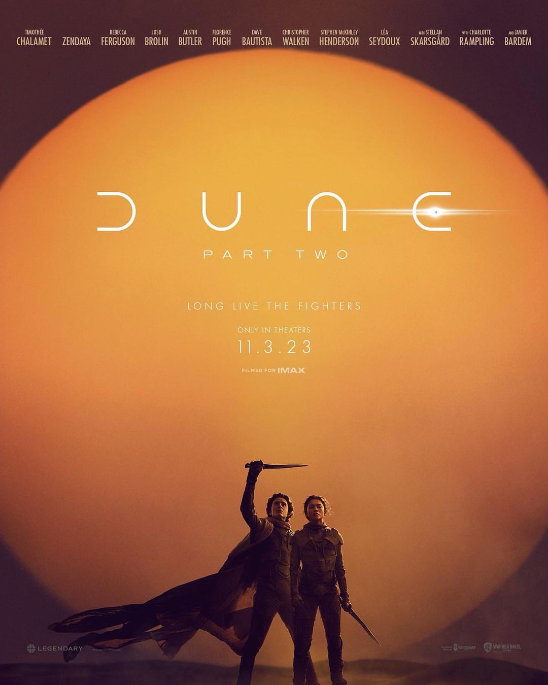 Dune: Part Two movie poster featuring Timothée Chalamet and Zendaya in character on a desert planet with a large sun in the background.