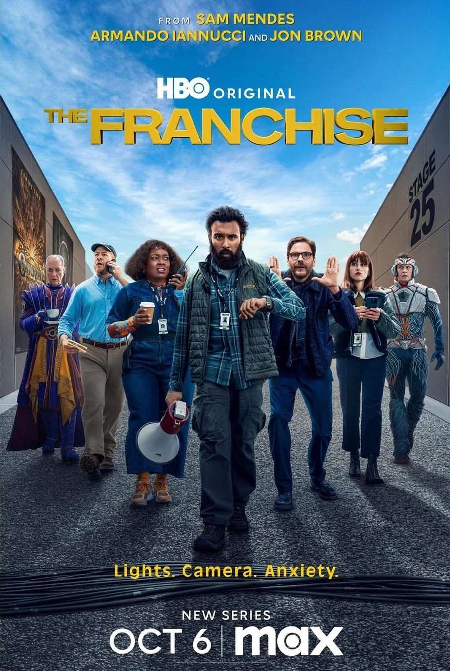Poster for HBO's The Franchise features a diverse cast of actors standing on an asphalt road, with film stage buildings in the background.