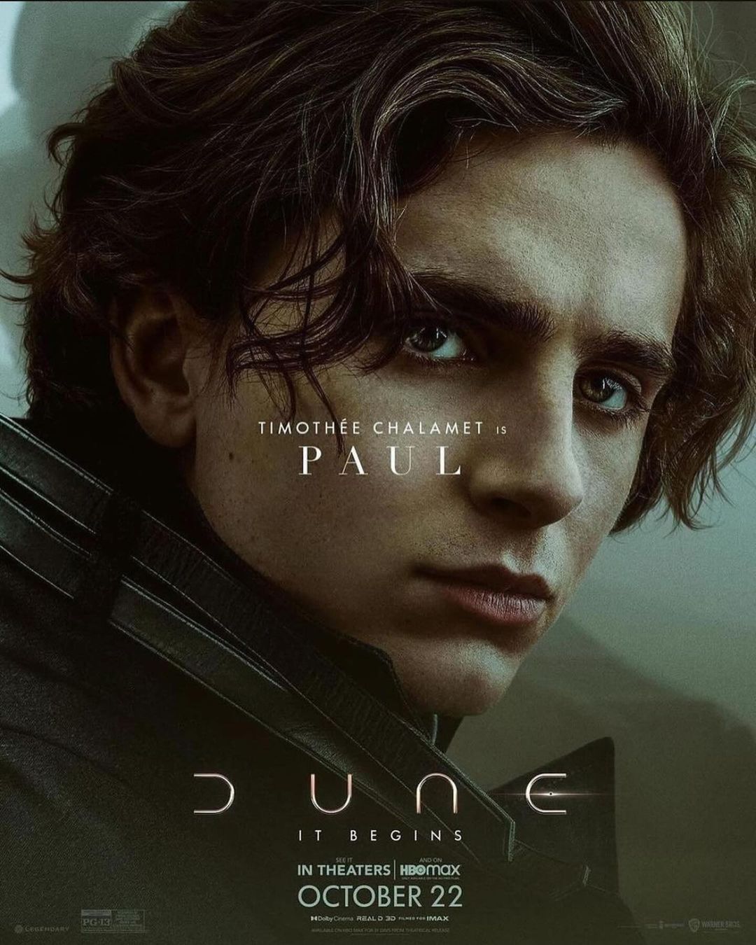 Close-up of Timothée Chalamet as Paul in the Dune movie poster, with dark hair, serious expression, and visible movie branding and release date.