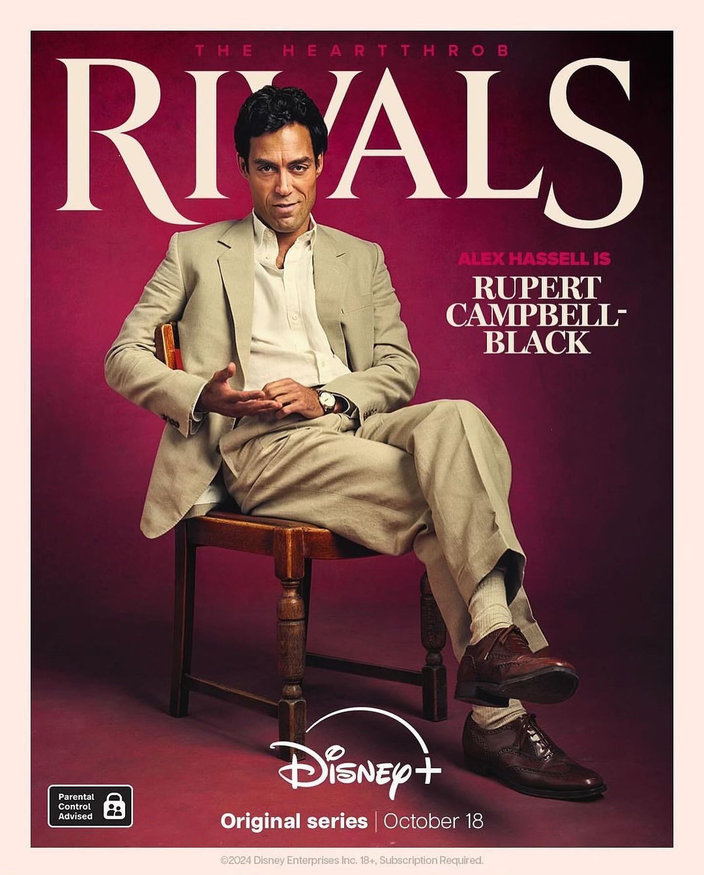 Movie poster for Rivals, featuring a dark-haired man in suit sitting on chair, set against a plum-colored background, with the title Rivals in white.
