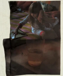 Collage style editorial photograph featuring a child interacting with a tablet and a glass of water, by Jason Nocito.