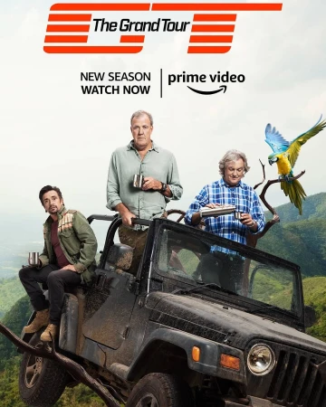 The Grand Tour promotional shot of Jeremy Clarkson, Richard Hammond, and James May in a Jeep with a parrot in a mountainous landscape.