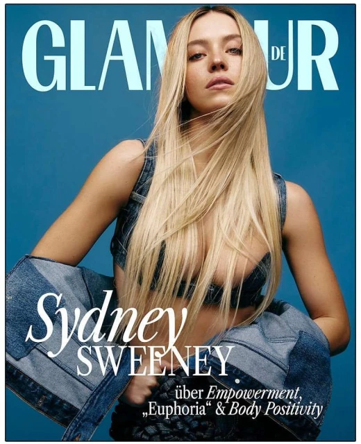 Glamour DE cover featuring Sydney Sweeney with long blonde hair, denim top, and blue background. Magazine cover with white bold sans-serif text.