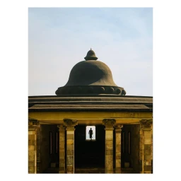 Silhouette of a person walking inside a classical stone pavilion with a domed roof under an open sky