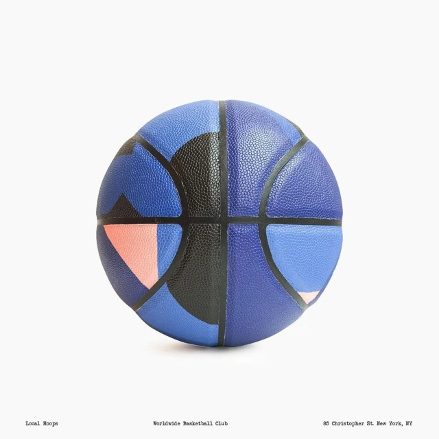 Blue and black patterned basketball centered on a plain white background with small typewriter text at the bottom