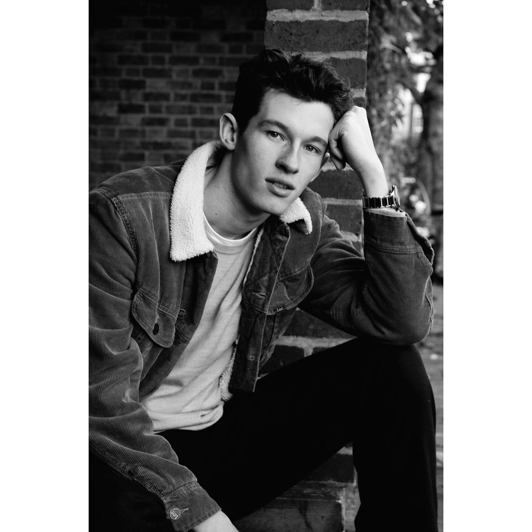 Portrait of a young man wearing a sherpa collar jacket outdoors in London photographed by Jessie Craig.