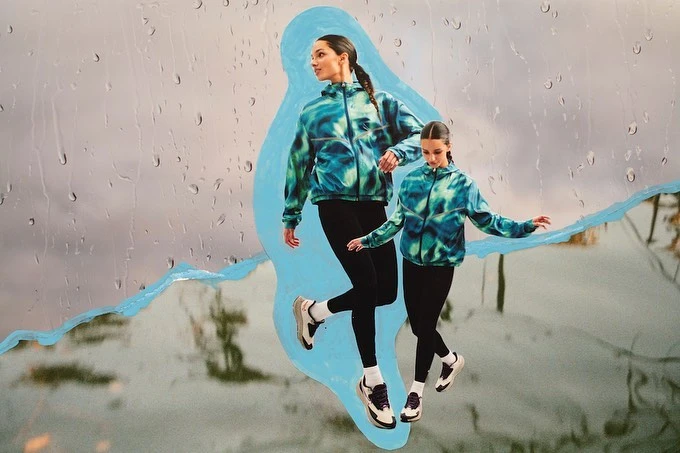 Two adult females in a collage-style image, wearing matching blue and green tie-dye jackets and black leggings, set against a watery background.