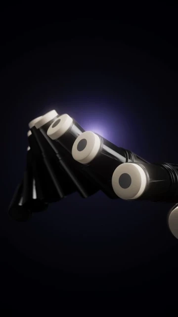 Close-up of black and white bagpipes against a dark background, showcasing the intricate details and design of the musical instrument.