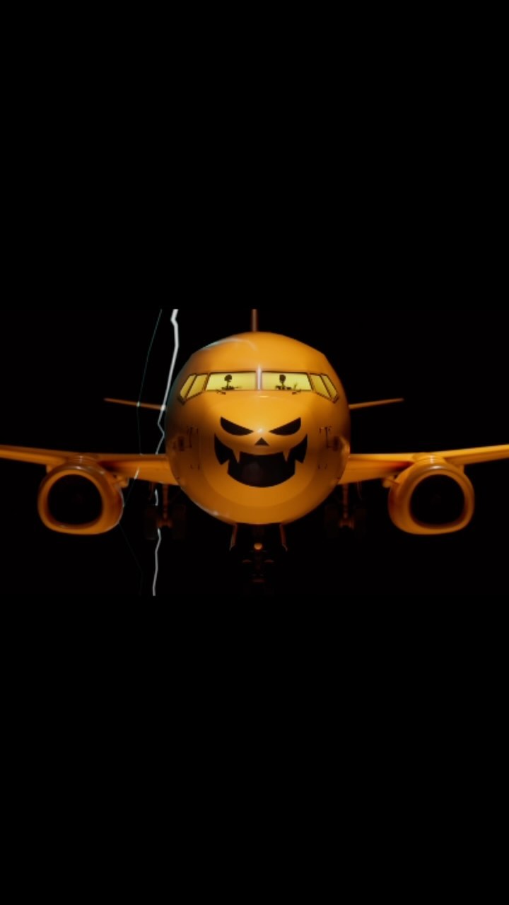 Airplane with Halloween face paint against a dark background, orange and black color scheme, seasonal holiday design.