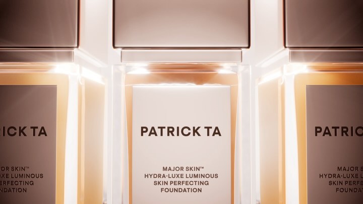 Patrick TA makeup foundation bottles in a row featuring the Major Skin Hydra-Luxe Luminous Skin Perfecting Foundation line.