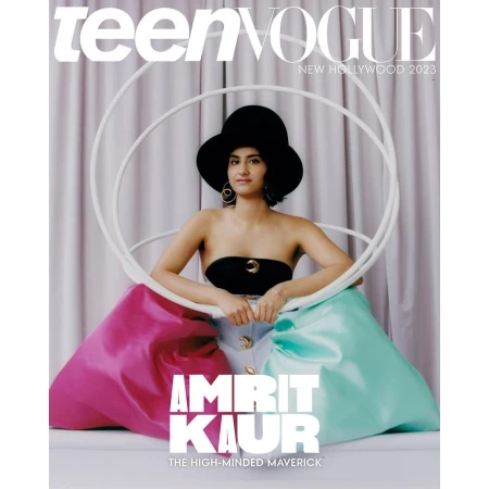 Teen Vogue cover featuring Amrit Kaur in a black top and large hat, seated with pink and teal draped fabric, promoting 'New Hollywood 2023'.