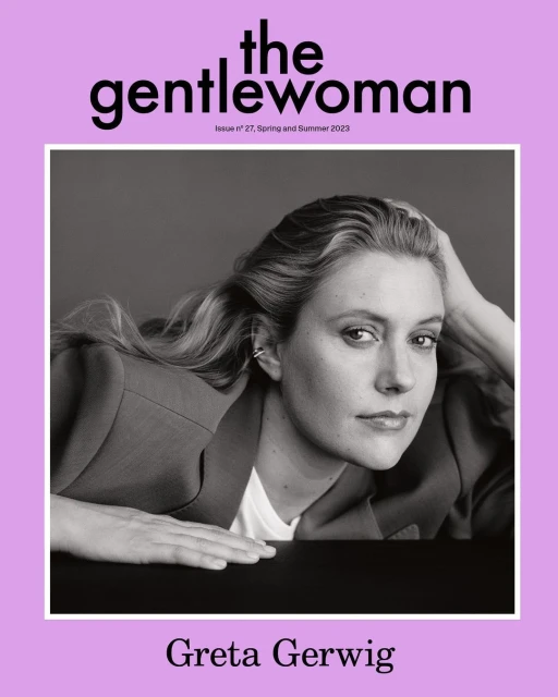 Greta Gerwig poses for The Gentlewoman magazine cover in black and white, wearing a blazer and white shirt, against a grey background.