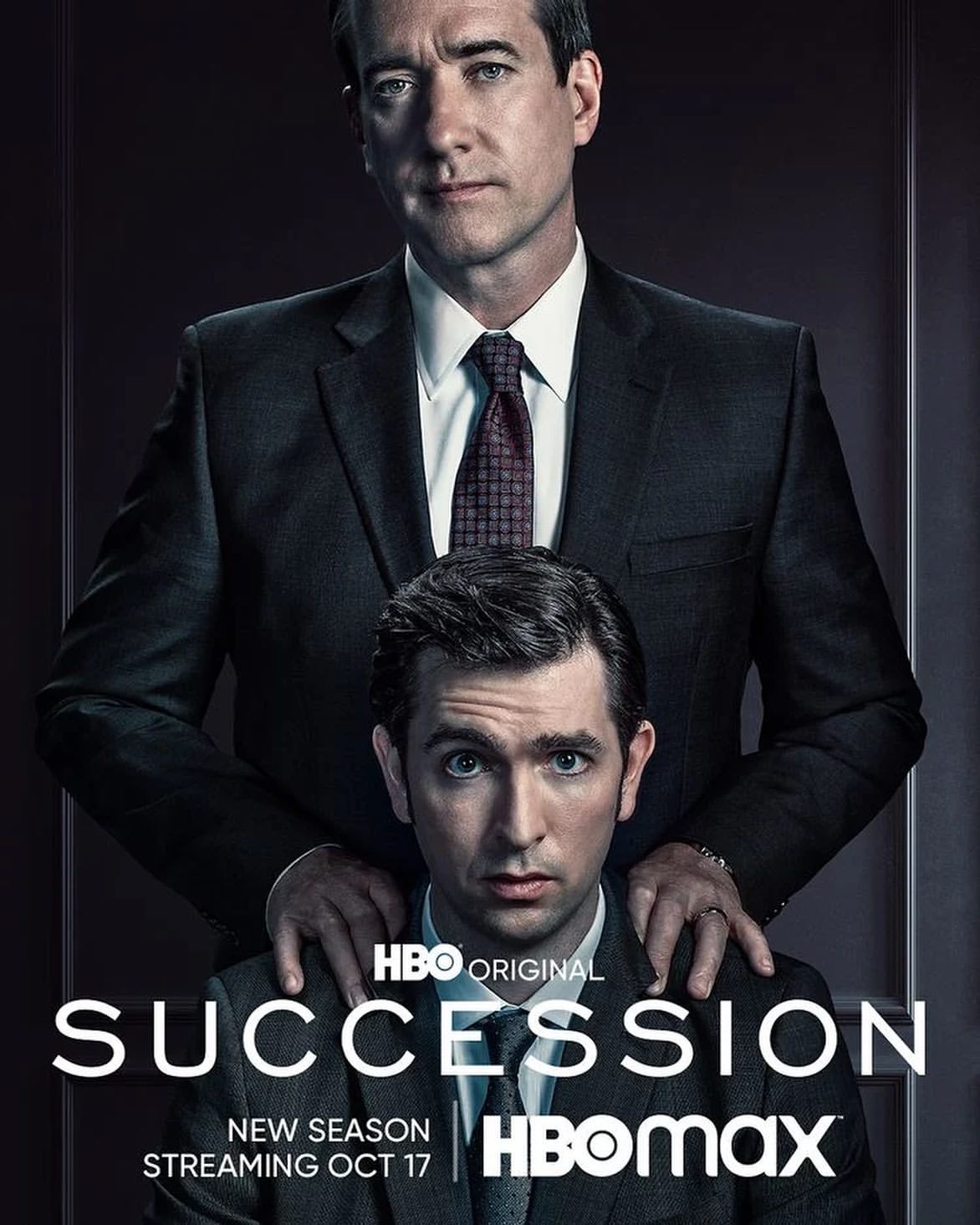 Promotional image for HBO's 'Succession' featuring two adult men wearing suits against a dark background. Text overlays the image.