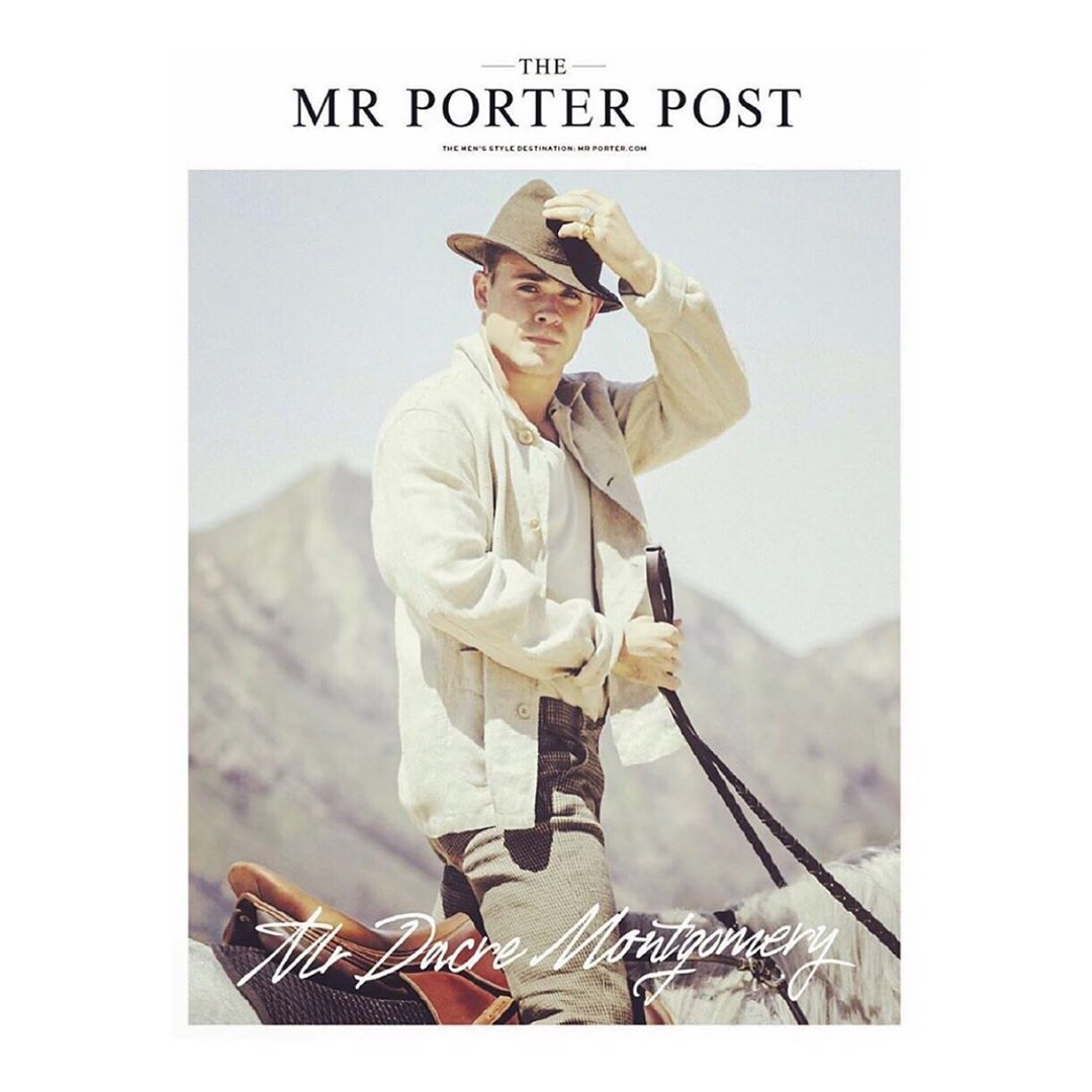 Dacre Montgomery poses in an outdoor editorial shot for Mr. Porter Post, wearing a hat and jacket while riding a white horse.