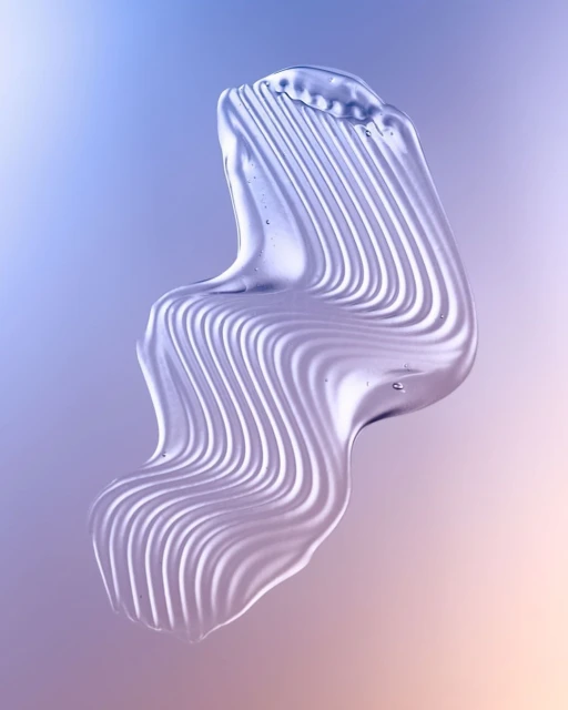 Abstract close-up of clear gel-like material with smooth, wavy lines against a gradient background in shades of purple and beige.