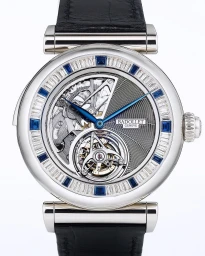 Close-up product shot of a luxury skeleton wristwatch with a diamond and sapphire bezel and black leather strap against a white background.