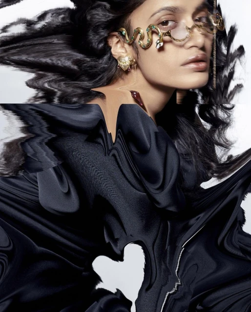 Woman with glasses shaped like snake, fashion-forward portrait in black top and textured digital effects on a white studio background.