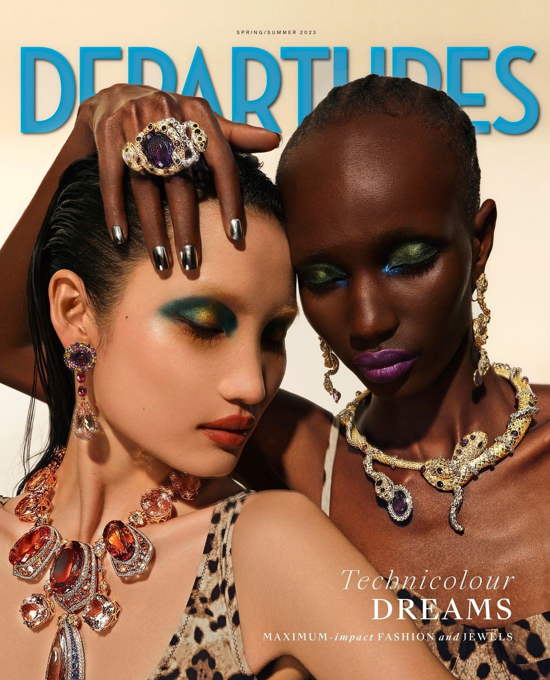Magazine cover featuring two women wearing colorful makeup and jewelry, showcasing spring/summer fashion and beauty trends with vibrant colors.