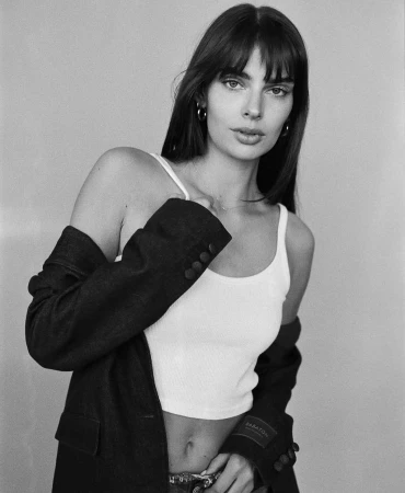Portrait of a woman wearing a white tank top and dark blazer by photographer Jon Stars in Los Angeles