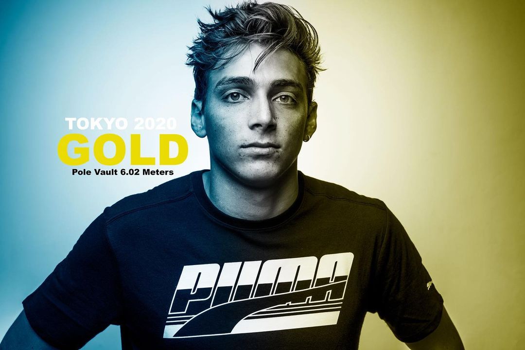 Portrait of athlete with Puma shirt. Image is split with yellow and blue lighting for dynamic studio aesthetic, Tokyo 2020 text.