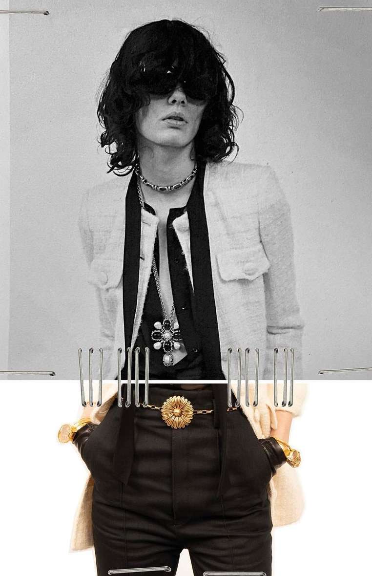 Black and white fashion shot of a person wearing a light-colored jacket, dark shirt, and oversized sunglasses, with metal clip accents.
