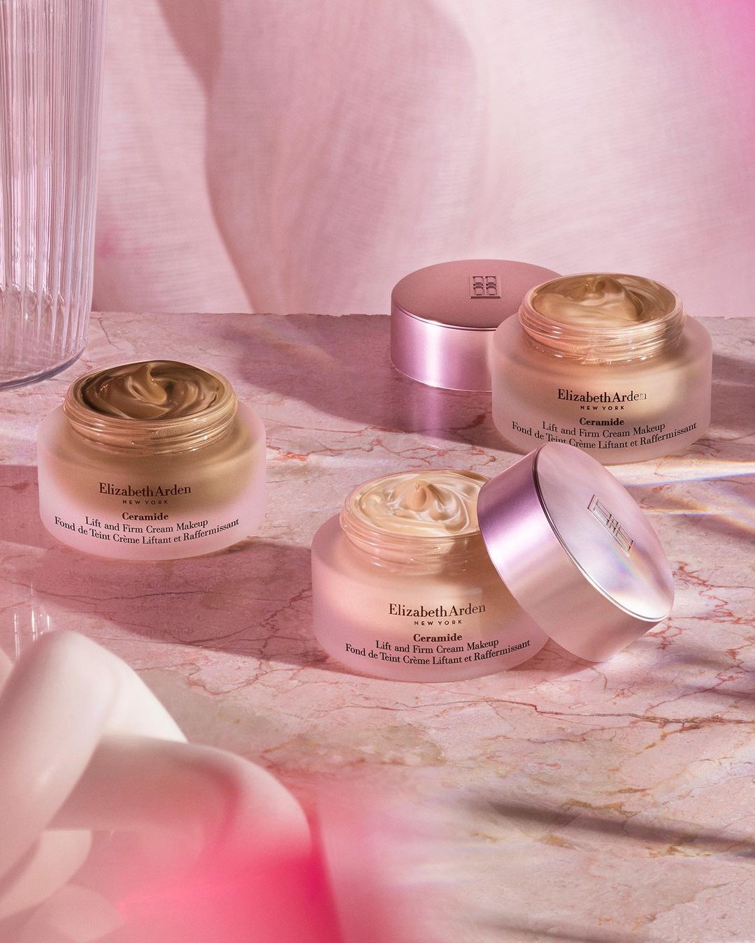 Elizabeth Arden Ceramide makeup: luxurious skincare-infused foundation on a pink marble surface, soft lighting, and elegant aesthetic.