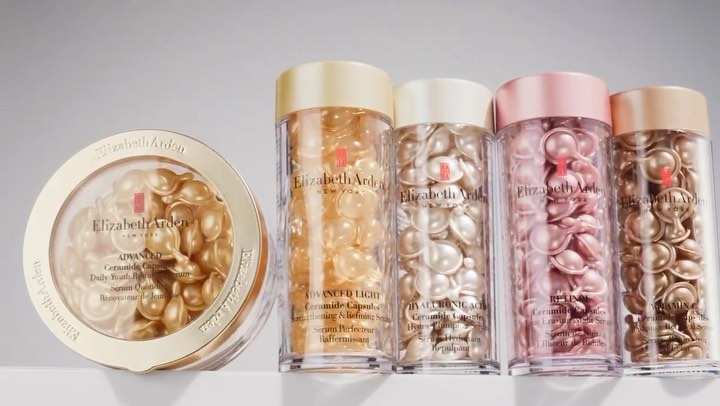 Elizabeth Arden ceramide capsules skincare products in clear containers, arranged in a row showcasing different serum varieties.