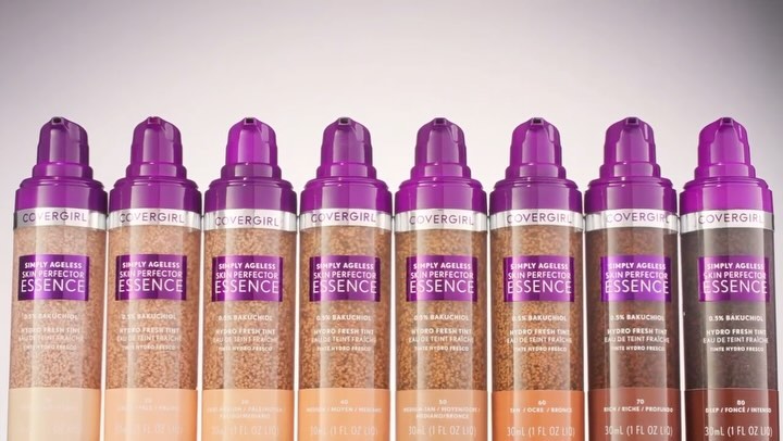 Multiple shades of CoverGirl Simply Ageless Skin Perfector Essence foundation bottles arranged against a light backdrop.