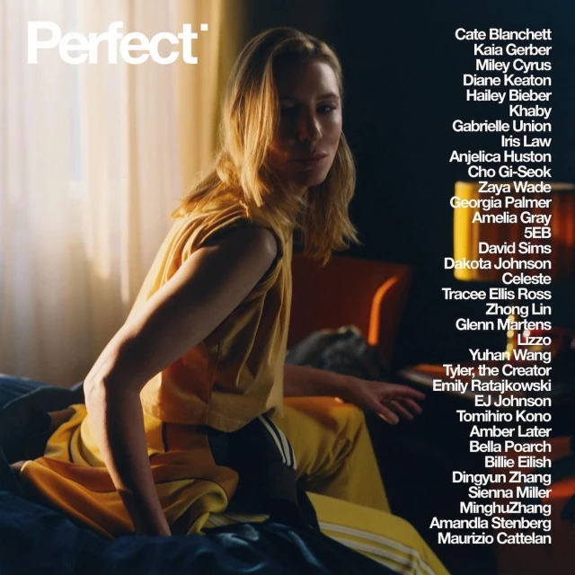 Blonde woman in yellow athleisure sits on a bed; a "Perfect" magazine cover featuring celebrities on the right side of the frame.