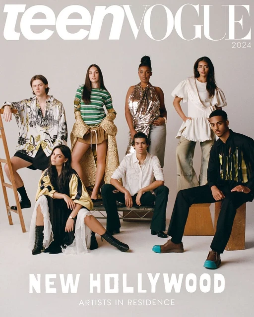 Teen Vogue 2024 cover featuring a group of seven young diverse models wearing fashionable clothing, posing indoors in a photo studio.