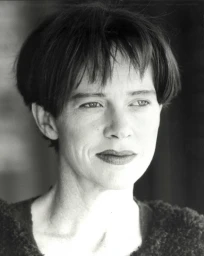 Monochrome headshot of a woman with short dark hair looking slightly away from the camera in Sydney.