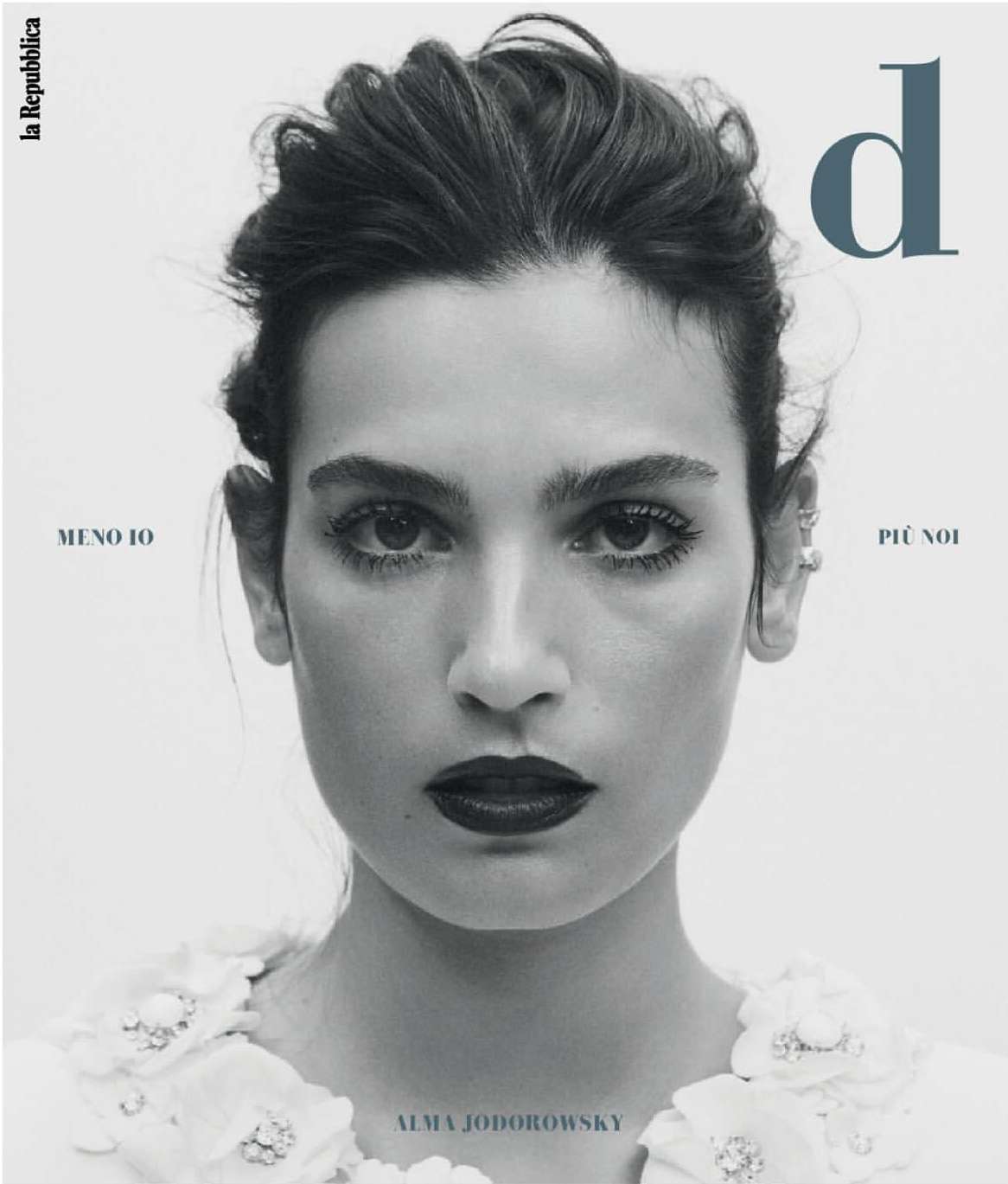 Close-up black and white portrait of Alma Jodorowsky on the cover of La Republica D magazine, showcasing dark hair, dark lipstick, and white collared shirt.