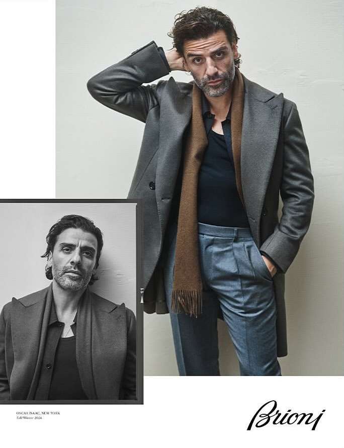 Man poses in grey coat and blue trousers with a sepia-toned close-up insert to the left, logo for Brioni at the bottom.