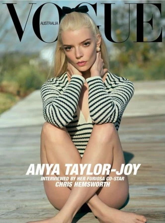 Vogue Australia cover featuring Anya Taylor-Joy, seated on boardwalk in striped top and minimal makeup, against blurred outdoor background, 2024.