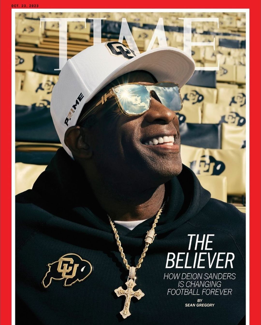 Time magazine cover featuring a smiling African-American man wearing sunglasses and a Colorado Buffaloes baseball cap and hoodie.